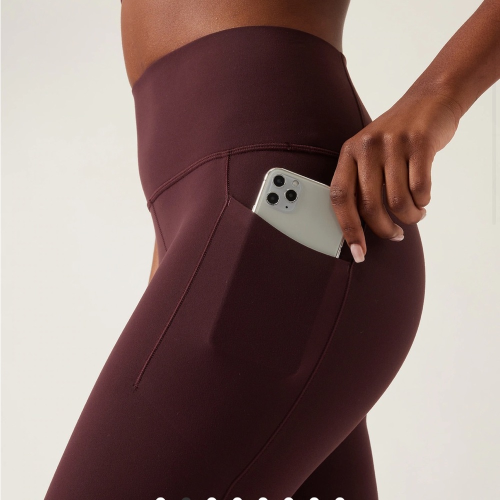 Athleta salutation stash tight